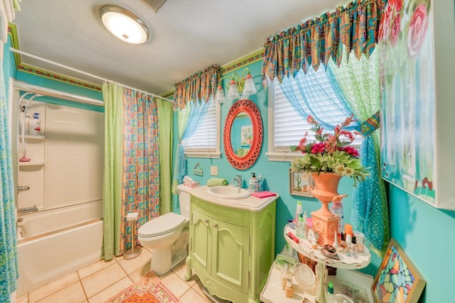 full bathroom featuring shower / bath combination with curtain, vanity, toilet, tile patterned floors, and a textured ceiling