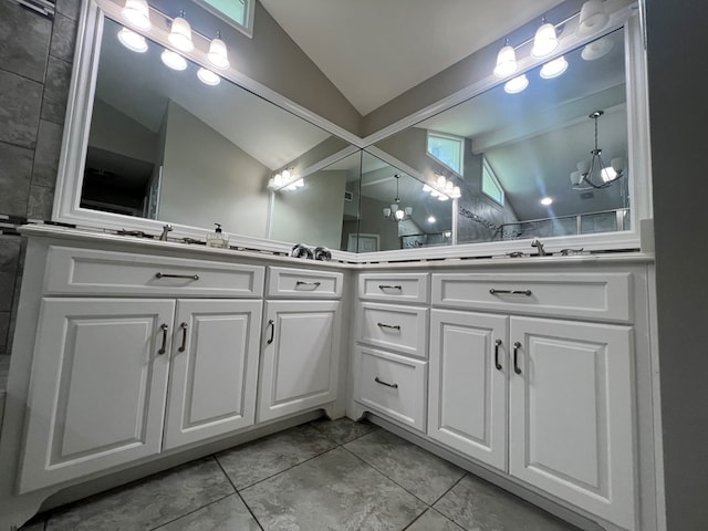 bathroom featuring vanity and vaulted ceiling with beams