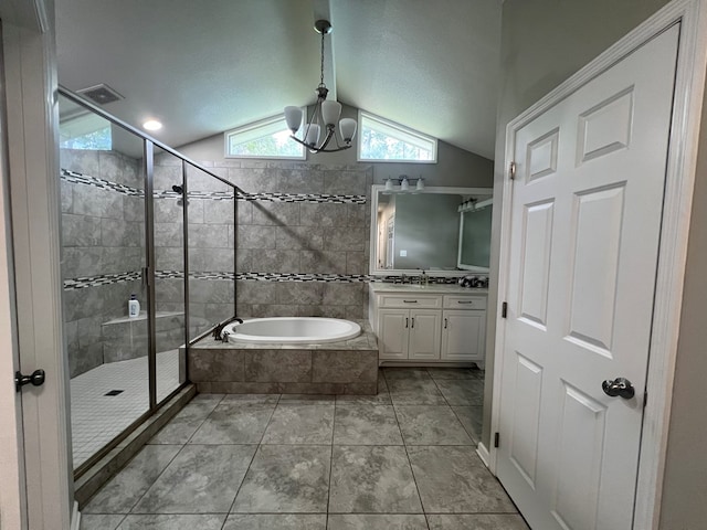 bathroom featuring vanity, vaulted ceiling, tile patterned floors, and shower with separate bathtub