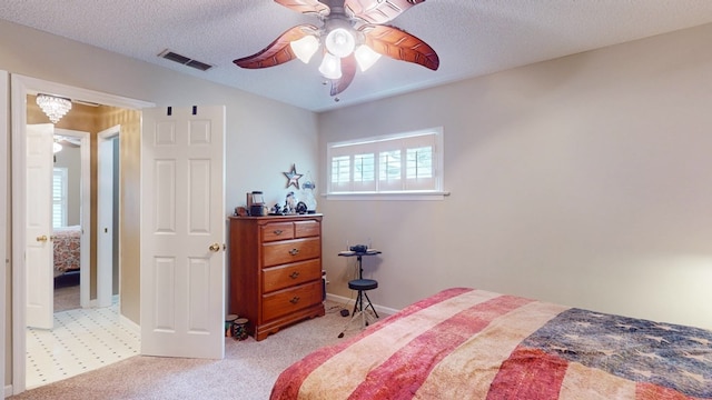 1017 Rowland Rd, Boston, GA 31626 - bedroom with light colored carpet, ceiling fan, and a textured ceiling