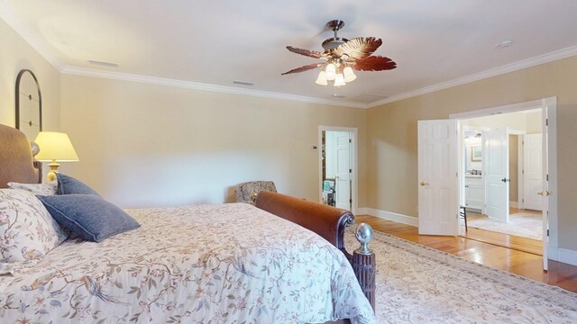 1017 Rowland Rd, Boston, GA 31626 - bedroom with wood finished floors, baseboards, ornamental molding, and a ceiling fan