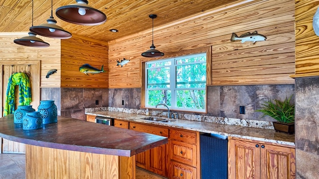 1017 Rowland Rd, Boston, GA 31626 - kitchen with wood ceiling, a sink, wooden walls, brown cabinets, and dishwasher