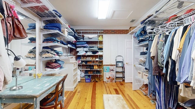 1017 Rowland Rd, Boston, GA 31626 - spacious closet featuring light wood-style flooring and attic access
