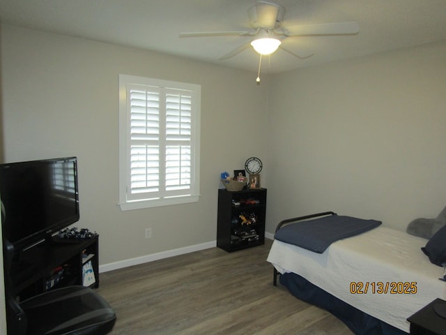 bedroom featuring ceiling fan and hardwood / wood-style floors