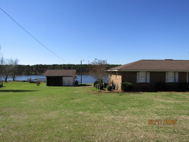 view of yard with a water view