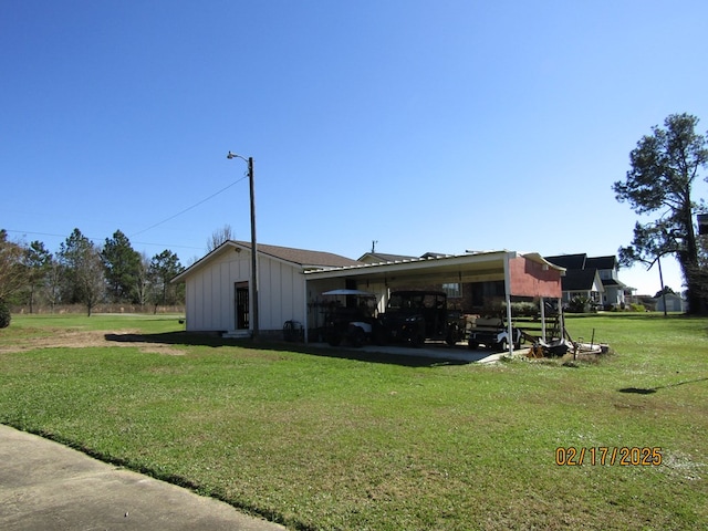 view of home's exterior featuring a carport and a lawn