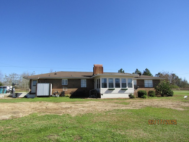 exterior space with a lawn