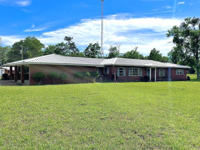 ranch-style house with a front yard