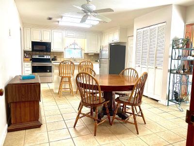 dining room featuring ceiling fan and light tile patterned flooring