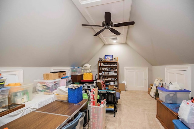 interior space with ceiling fan, visible vents, vaulted ceiling, and light colored carpet