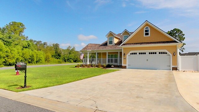 view of front facade with a porch and a front yard