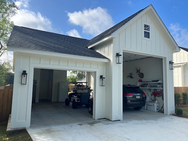 garage with fence