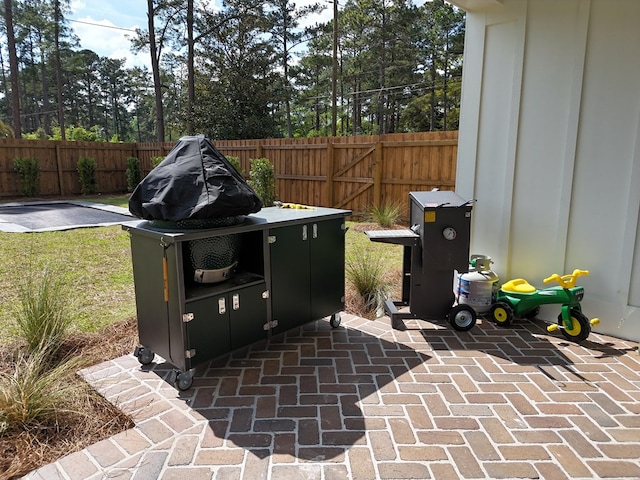 view of patio / terrace with fence