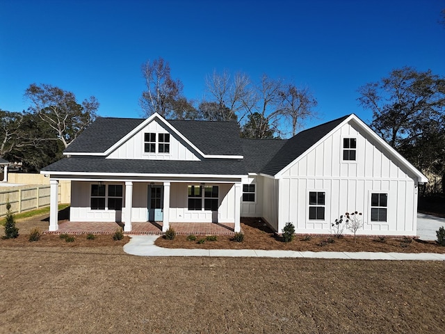 modern farmhouse style home with a porch