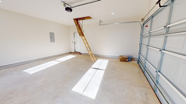 garage featuring a garage door opener and electric panel