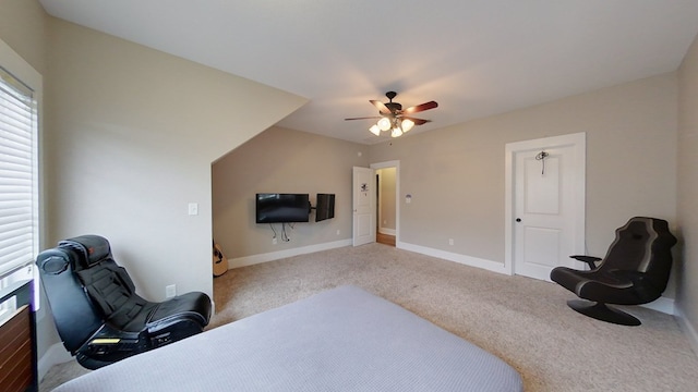 carpeted bedroom with ceiling fan