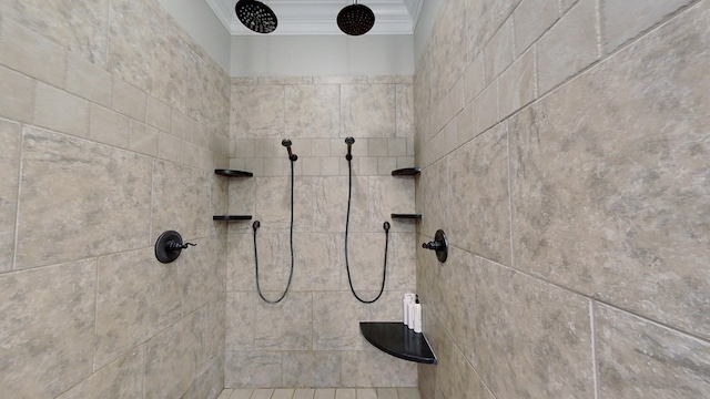 details with a tile shower and crown molding