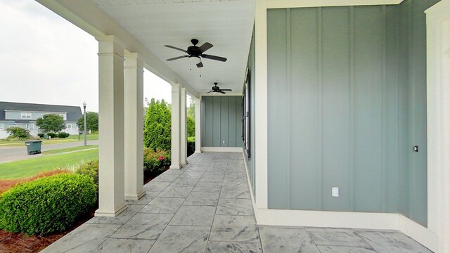 view of patio featuring ceiling fan