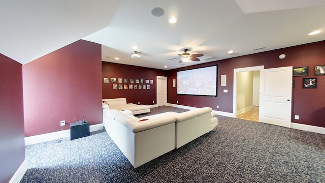 cinema room featuring carpet and ceiling fan