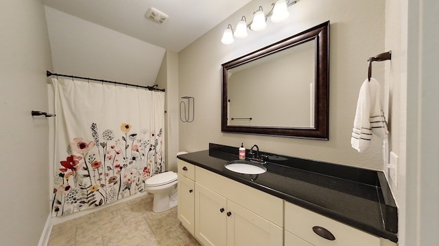 bathroom with vanity, toilet, and a shower with shower curtain