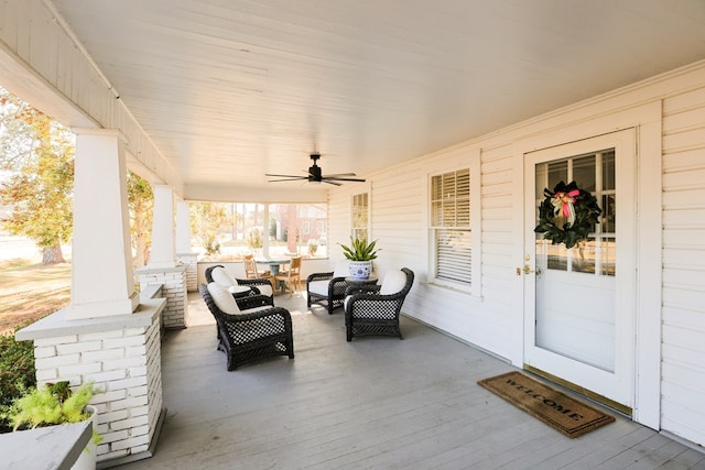 view of patio / terrace with ceiling fan, an outdoor hangout area, and a porch