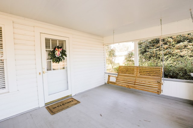 property entrance with covered porch