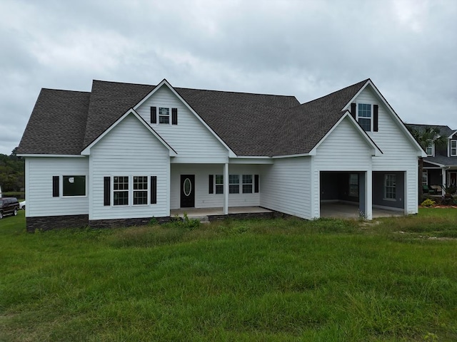 view of front of property with a front lawn