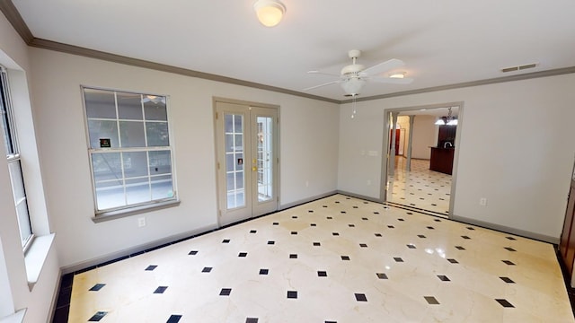 empty room with ornamental molding, ceiling fan, and french doors