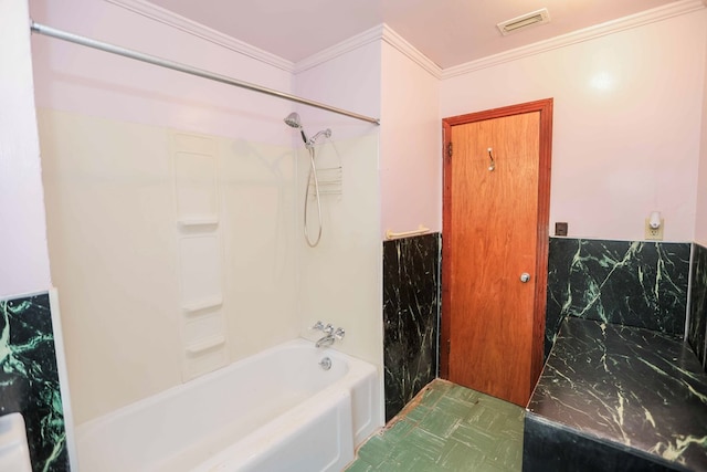 bathroom featuring crown molding and bathtub / shower combination