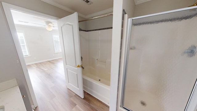 bathroom featuring crown molding, ceiling fan, walk in shower, and hardwood / wood-style floors