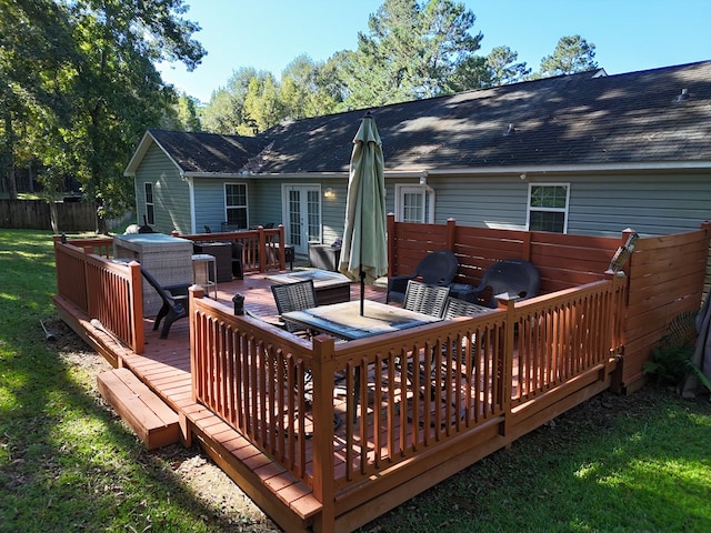 wooden deck featuring french doors