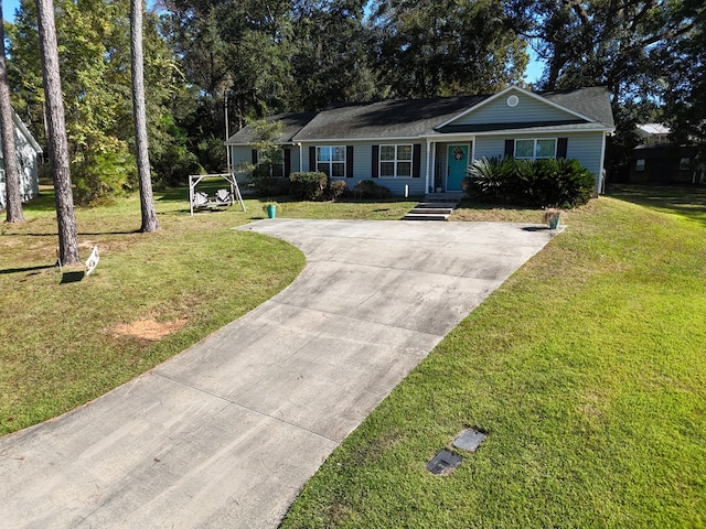 single story home featuring a front lawn