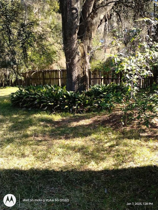 view of yard featuring fence