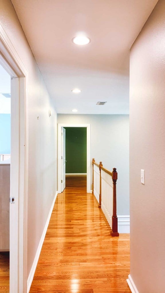 200 Sawgrass Ln, Thomasville, GA 31757 - hall with light wood-type flooring, an upstairs landing, and recessed lighting