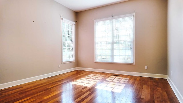 200 Sawgrass Ln, Thomasville, GA 31757 - spare room with plenty of natural light and hardwood / wood-style flooring