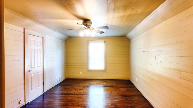 200 Sawgrass Ln, Thomasville, GA 31757 - empty room featuring wood walls, ceiling fan, dark wood-type flooring, lofted ceiling, and wooden ceiling