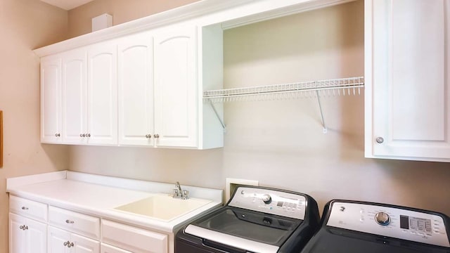 200 Sawgrass Ln, Thomasville, GA 31757 - washroom featuring washing machine and clothes dryer and cabinet space