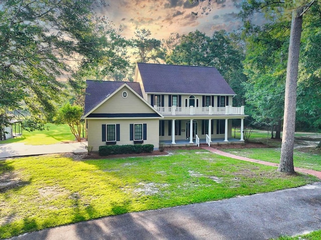 200 Sawgrass Ln, Thomasville, GA 31757 - colonial-style house with covered porch, a balcony, and a front yard