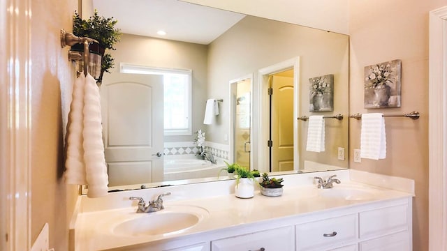 200 Sawgrass Ln, Thomasville, GA 31757 - bathroom with double vanity and a garden tub