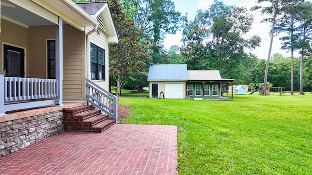 200 Sawgrass Ln, Thomasville, GA 31757 - view of green lawn with a patio area and view of wooded area