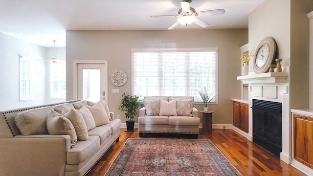 200 Sawgrass Ln, Thomasville, GA 31757 - living room featuring a ceiling fan, a fireplace, and dark wood-style floors