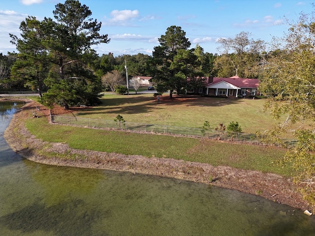 view of yard with a water view