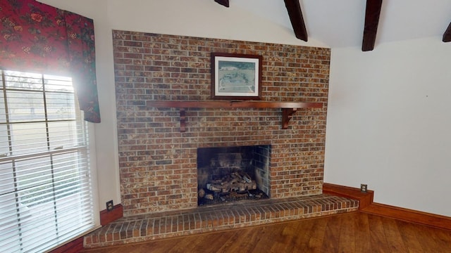 room details featuring wood-type flooring and a fireplace