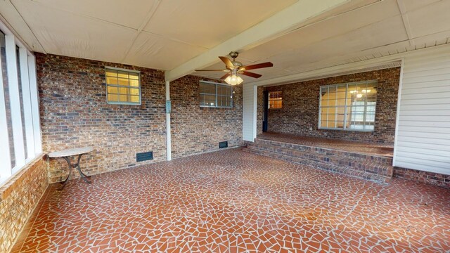 view of patio featuring ceiling fan