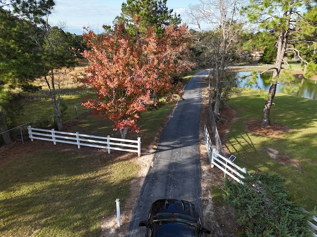 view of road featuring a water view