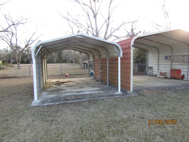 view of parking / parking lot featuring a carport