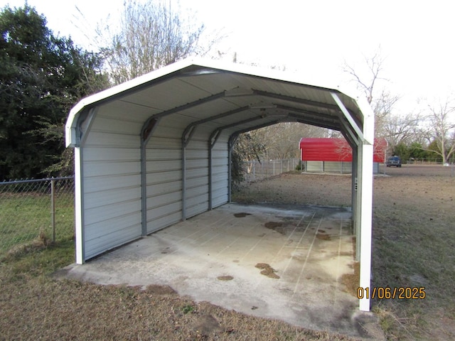 view of parking / parking lot featuring a carport