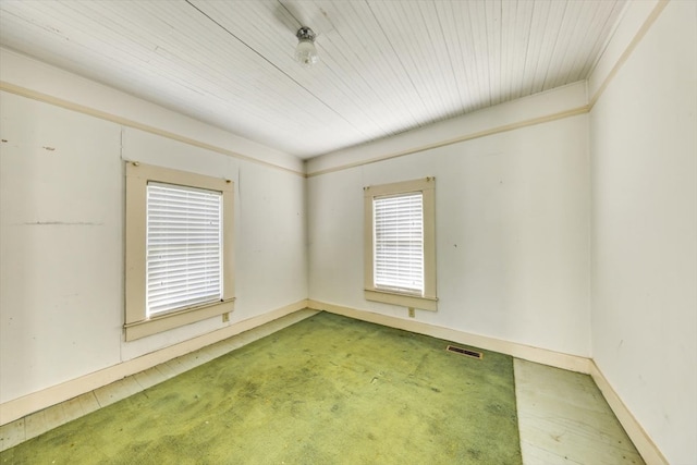 unfurnished room with carpet floors