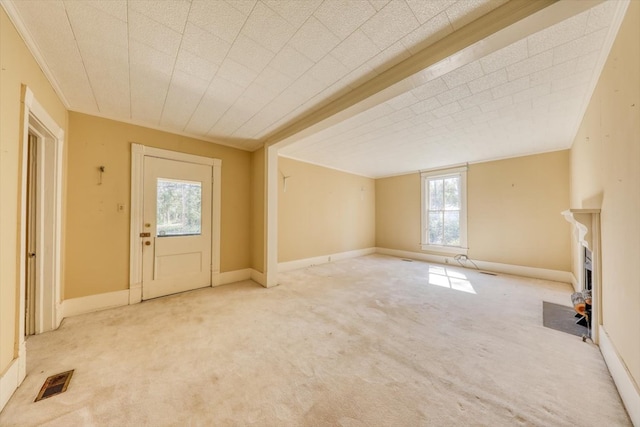 view of carpeted foyer