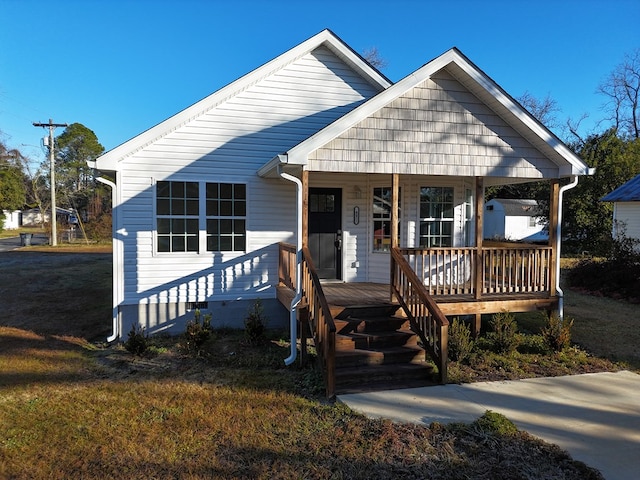 bungalow-style home with covered porch